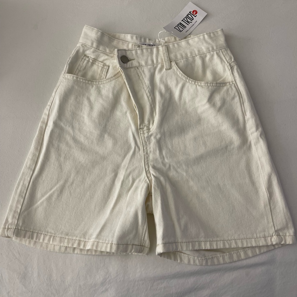 Cream diagonal button up shorts